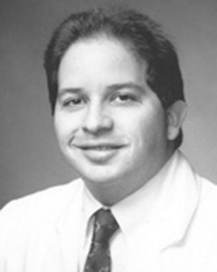 Gus  Bazan,  M.D. 