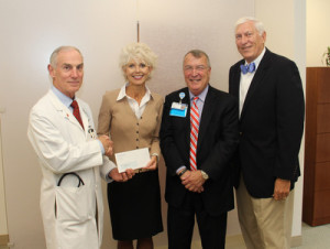 Beyond Abuse: (From Left): Cardiologist Dr. Ennis James is joined by Cathy Miller, Executive Director for Beyond Abuse, and Self Regional CEO Jim Pfeiffer and Self Regional Board of Trustees Chairman Len Bornemann.