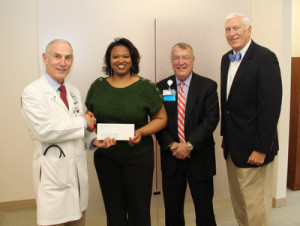 Community Initiatives/Clinica Gratis: (From Left): Cardiologist Dr. Ennis James is joined by Teresa Goodman, Executive Director for Community Initiatives, and Self Regional CEO Jim Pfeiffer and Self Regional Board of Trustees Chairman Len Bornemann.