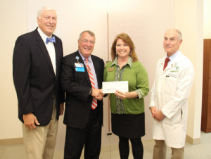 Greater Greenwood United Ministry: (From Left): Self Regional Board of Trustees Chairman Len Bornemann is joined by Self Regional CEO Jim Pfeiffer, Rosemary Bell, Executive Director of Greater Greenwood United Ministry, and Cardiologist Dr. Ennis James, who serves on the Community Outreach Committee.