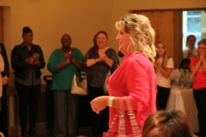 Angela Winchester walks the pink runway from the 2013 Pretty in Pink celebration. Ms. Winchester is a breast cancer survivor who works in Imaging Services at Self Regional and says she uses each day "to be a voice for breast cancer survival."