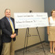 (From left): Mark Kasper from the Greenwood County Community Foundation presents James M. Manley, Treasurer of the Self Regional Healthcare Board of Trustees, with a contribution of $150,000 to benefit women's health initiatives. Kasper was joined by Denise and Jim Medford, owners of the Links at Stoney Point, the site of the charity golf tournament held in May.