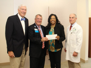 United Center for Community Care: (From Left): Self Regional Board of Trustees Chairman Len Bornemann is joined by Self Regional CEO Jim Pfeiffer, Deborah Parks, Executive Director of the United Center for Community Care, and Cardiologist Dr. Ennis James, who serves on the Community Outreach Committee.