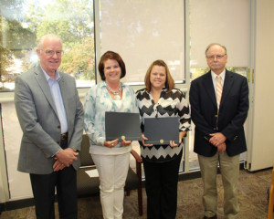 Pictured from left: retired Self Regional executive John Heydel, scholarship recipients Christy Fain and Julie Culbertson, and Director of Respiratory Care Services, Ron Deeder.