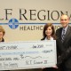 The Self Regional Healthcare Foundation's 2014 Mid-Winter Ball co-chair, Jane Dean (left), recently accepted a $10,000 check from Countybank representatives, Lynn Turner and David Tompkins and Greenwood Capital and Associate's John Wiseman.