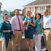 Ovarian cancer survivor Dianne Morgan has organized an awareness event on Sept. 22 to ensure other women know the signs and symptoms of ovarian cancer, which is often referred to as the "silent killer." Here Mrs. Morgan is joined by City Manager Charlie Barrineau, Meg Hawes from the South Carolina Ovarian Cancer Foundation, Self Regional Oncology Navigator Katie Davis and Greenwood Mayor Welborn Adams in front of the teal fountain in downtown Greenwood, colored in honor of Ovarian Cancer Awareness month. The free event, which will feature remarks from Dr. Amy Forrest and Dr. Donald Wiper III, will be held at 3 p.m. on Sept. 22 at Alexander Hall at First Presbyterian Church of Greenwood.