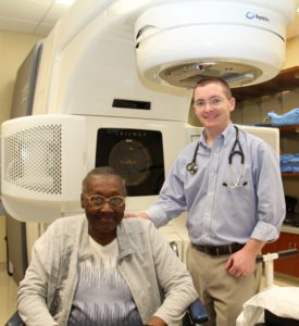 Gladys Roundtree, the first patient to receive stereotactic radiation therapy at the Self Regional Healthcare Cancer Center, and her radiation oncologist, Dr. Clint Wood.