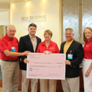 LEFT TO RIGHT: Doug May, Volunteer; Courtney Furman, Self Regional Healthcare Foundation Board Chair; Carolyn Lyons, Auxiliary President; Ken Coffey, Executive Director, Self Regional Healthcare Foundation, Susan Roberts, Auxiliary Vice President.