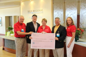 LEFT TO RIGHT: Doug May, Volunteer; Courtney Furman, Self Regional Healthcare Foundation Board Chair; Carolyn Lyons, Auxiliary President; Ken Coffey, Executive Director, Self Regional Healthcare Foundation, Susan Roberts, Auxiliary Vice President.