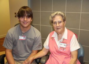 Clayton Langley, a volunteer at Self Regional for over 22 years, and great-grandson Wil Langley, now in the Junior Volunteer program. 