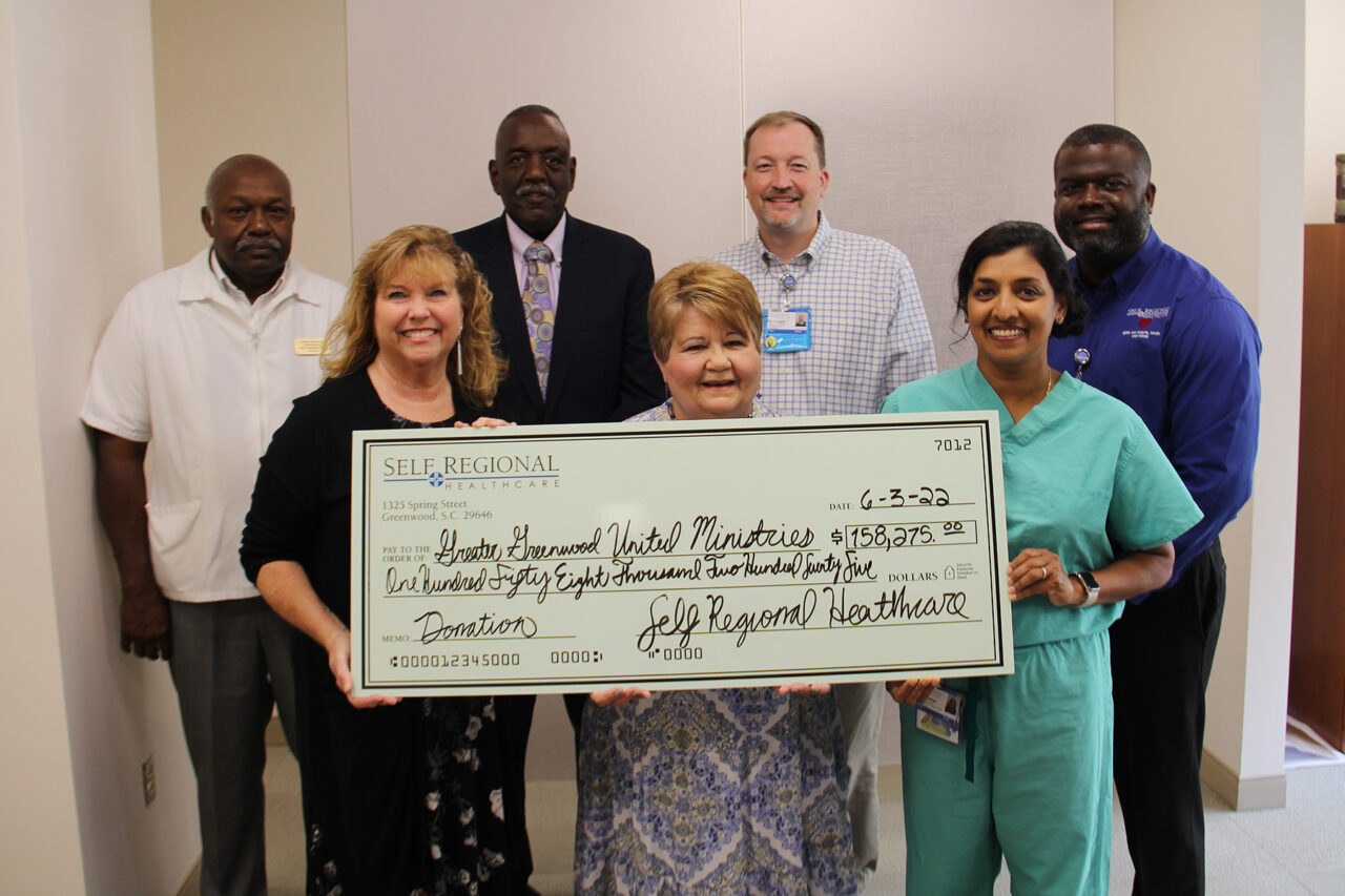 Self Regional Healthcare staff present 8,075 donation to Another Unmuzzled Ministries