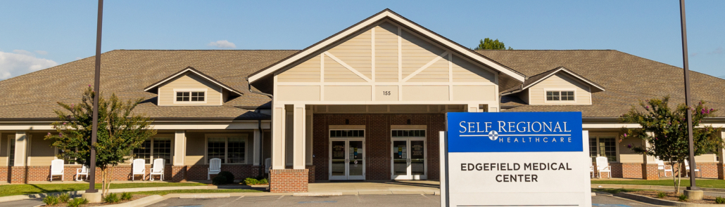 Front of a building with sign out front that reads Edgefield Medical Center
