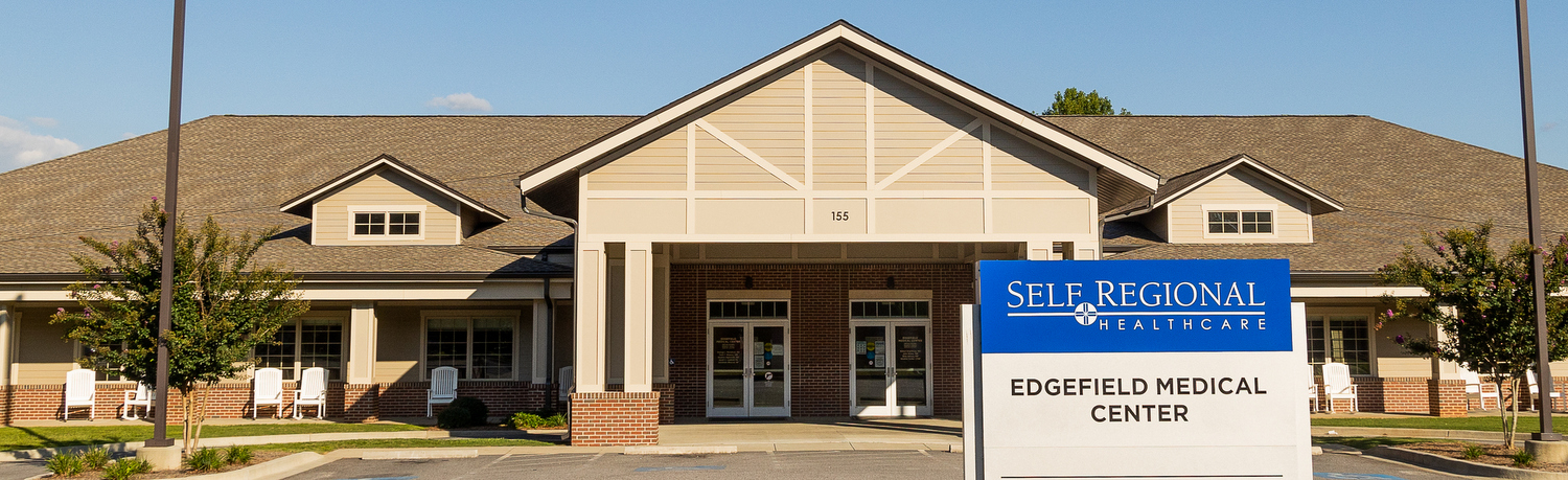 Front of a building with sign out front that reads Edgefield Medical Center