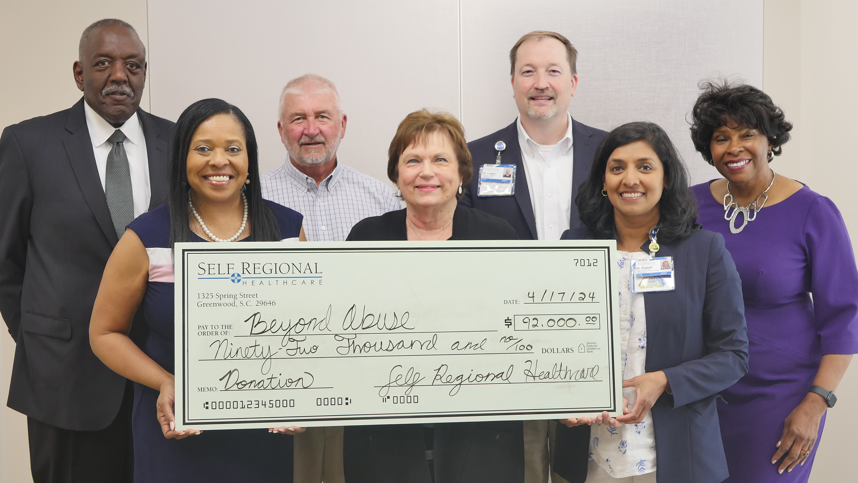 Self Regional Healthcare staff presenting a ,000 donation check to Beyond Blue organization.