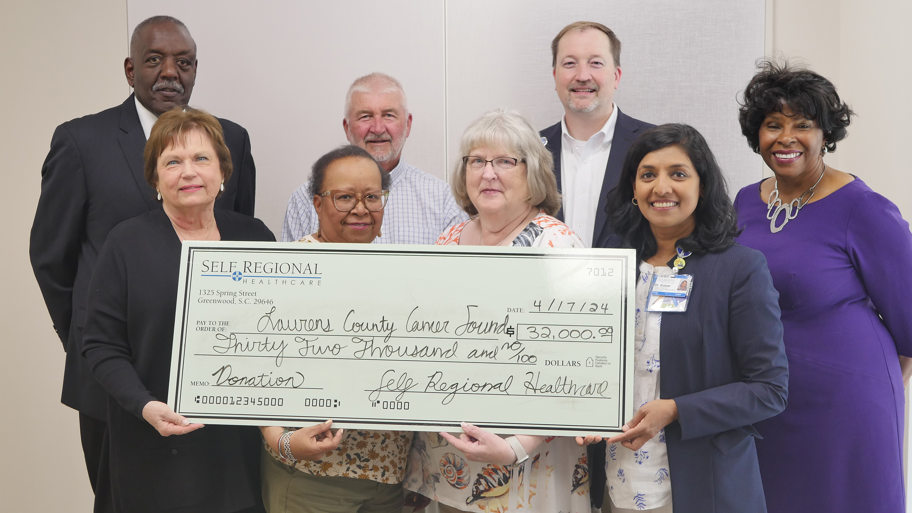 Self Regional Healthcare staff presenting ,000 donation check to Andrews County Cancer Council.