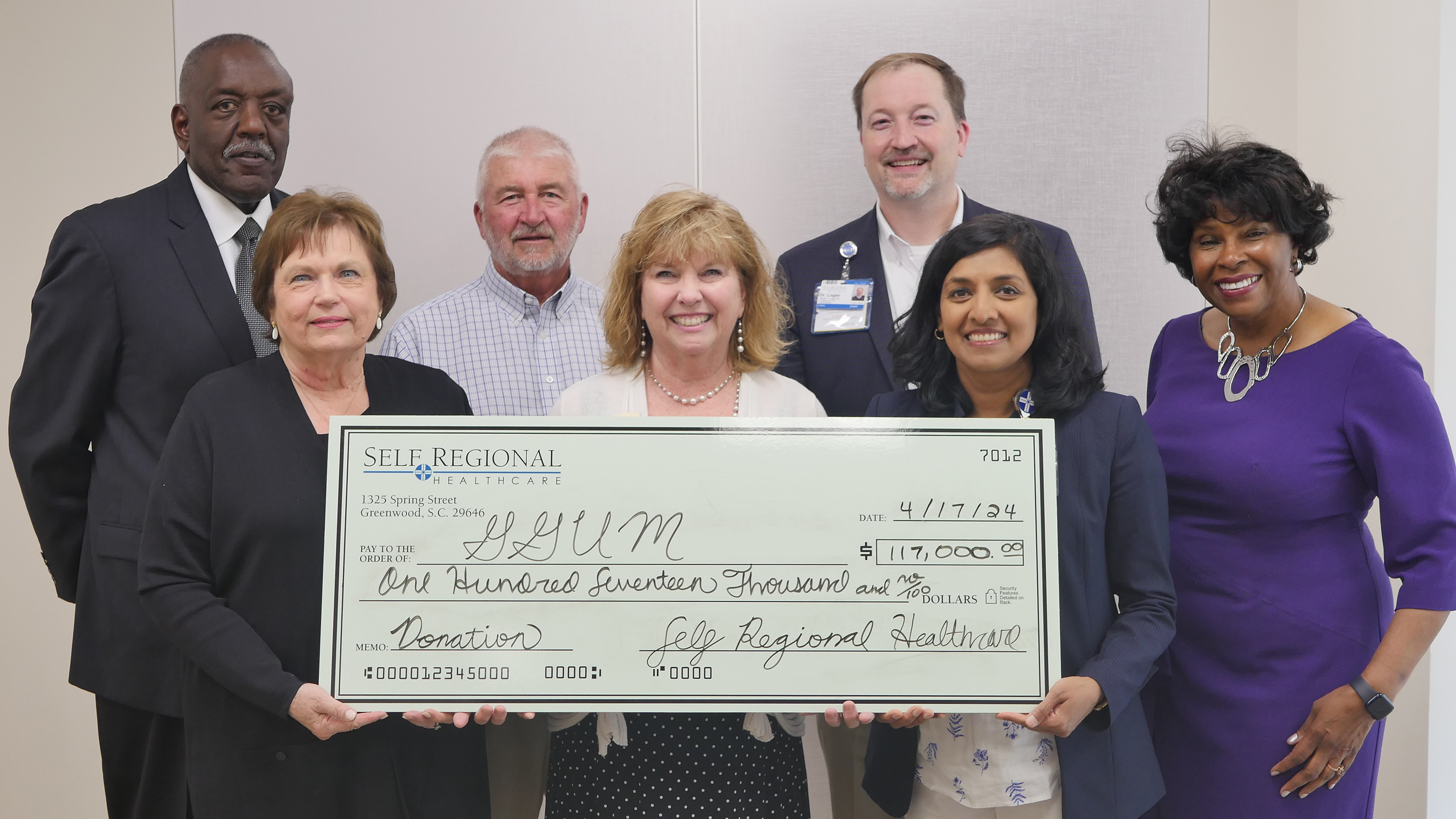 Self Regional Healthcare staff presenting donation check for ,017,000