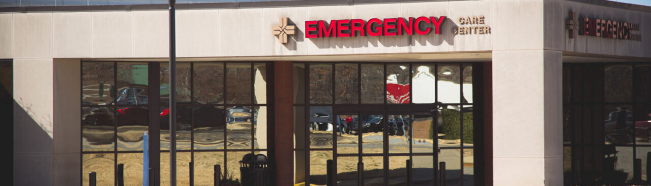 Self Regional Healthcare Emergency Care Center entrance with glass doors and windows