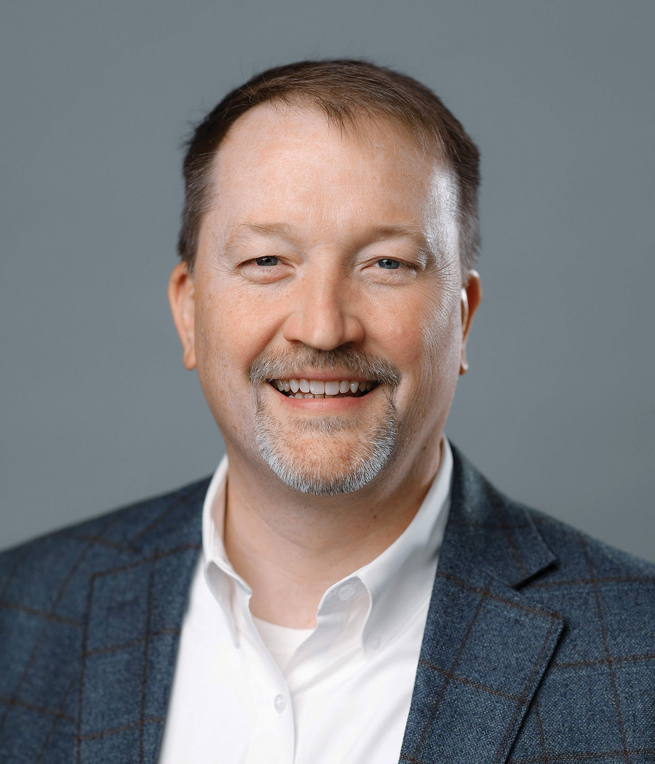 Professional headshot of a man in business attire for Self Regional Healthcare