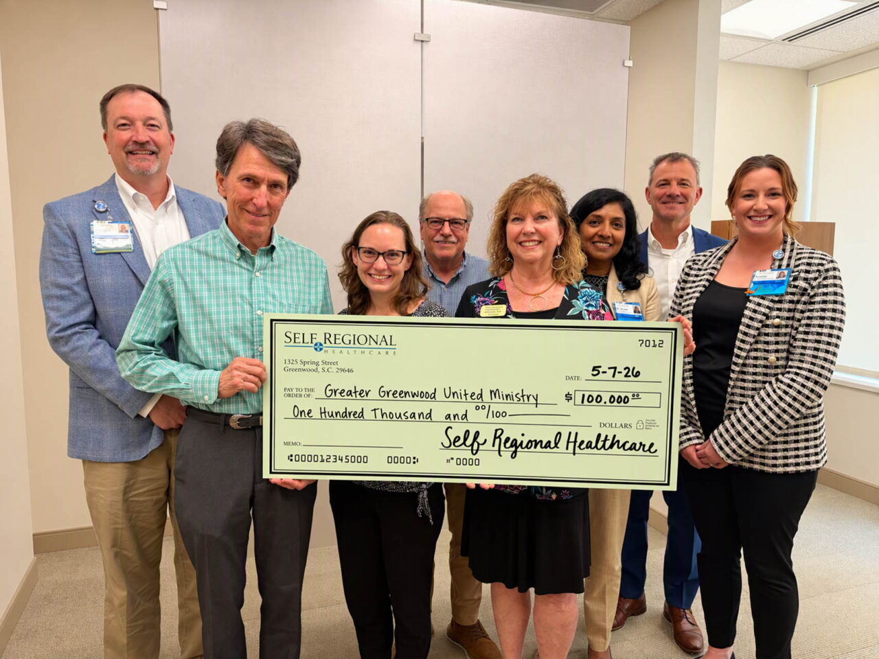 Self Regional Healthcare leaders present a check for 100,000 dollars to Greater Greenwood United Ministries