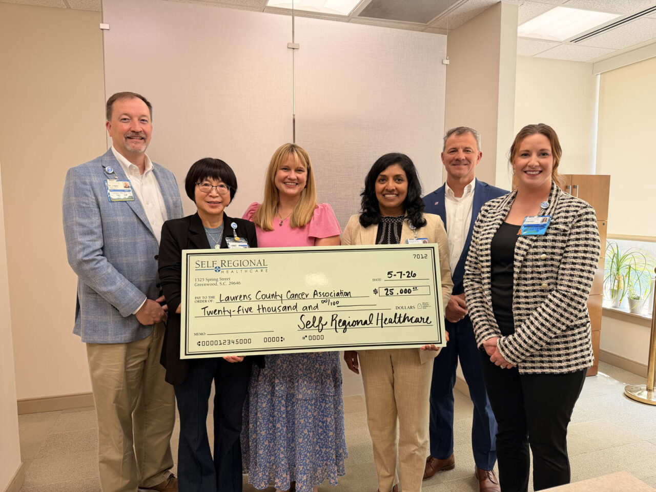 Self Regional Healthcare leaders present a check for 25,000 dollars to Laurens County Cancer Association