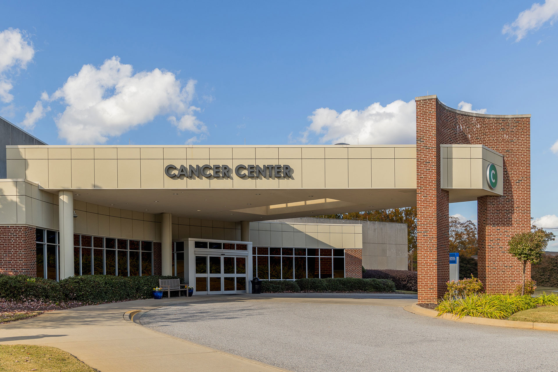 Self Regional Healthcare Cancer Center exterior entrance with brick and stone façade.